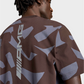 T-shirt Mercedes-AMG Marrone con Stampa Camo e Logo Adidas - Prodotto Ufficiale